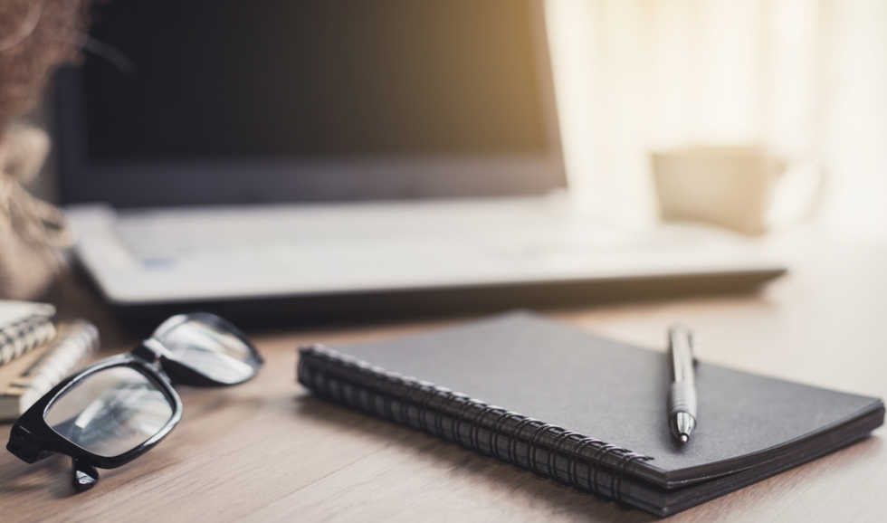 image of laptop and notebook