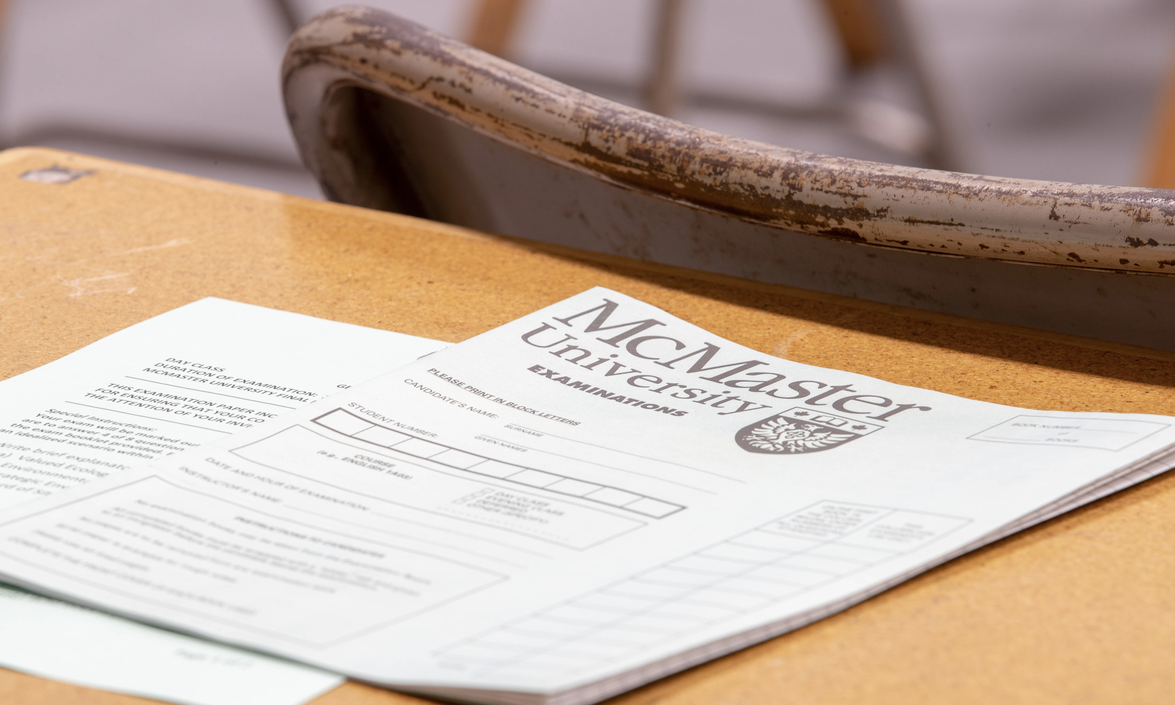 Picture of blank exam booklet with McMaster logo