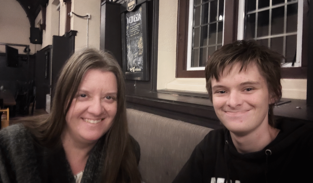 Lori and Trevor Goff celebrate the completion of their midterm exam at the Phoenix.