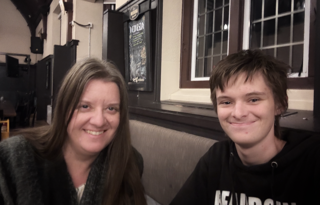 Lori and Trevor Goff celebrate the completion of their midterm exam at the Phoenix.
